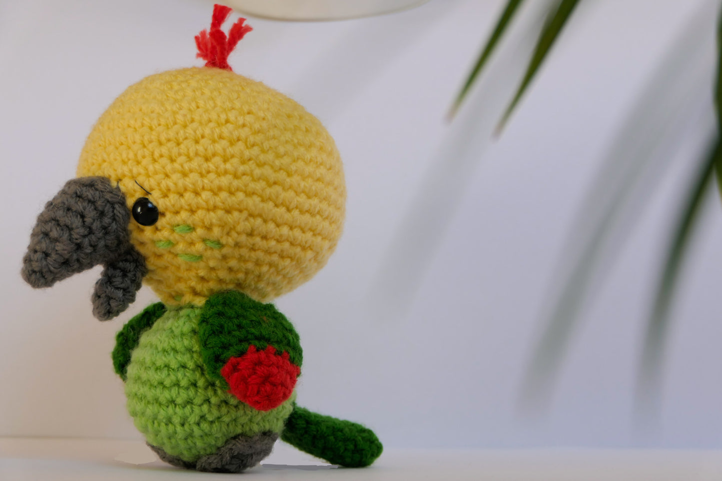 Crocheted parrot