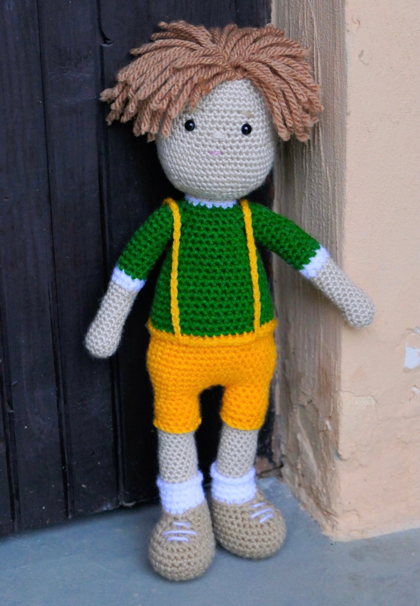 Crocheted boy doll